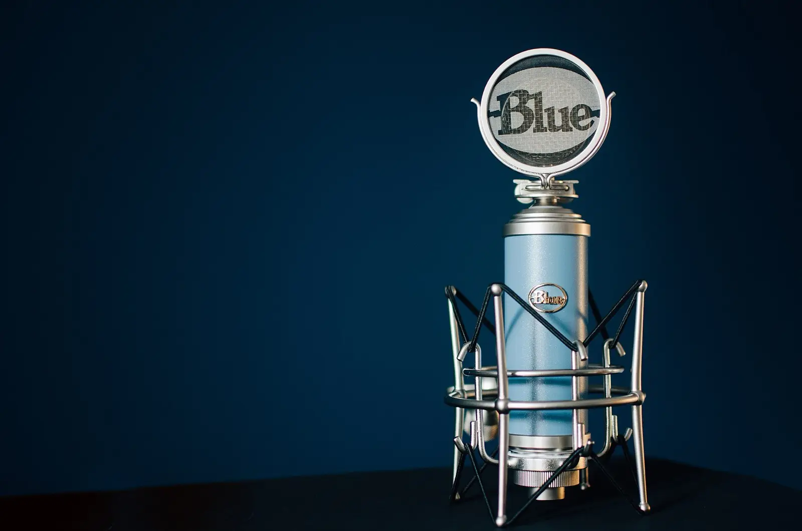 A blue studio microphone